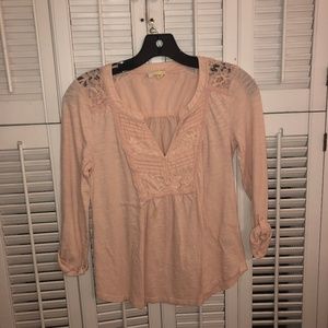 peach blouse with lace detailing